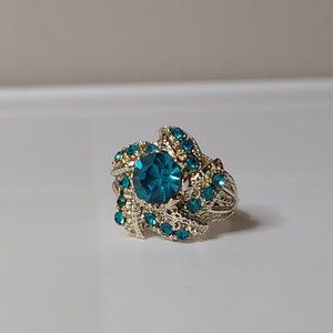 Size 7 Gold Tone Ring With Greenish Blue Plastic Stones